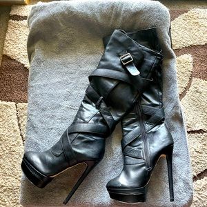 Tall heel black boots